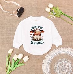 Cow-nt Your Blessings Romper Sweatshirt, Western America Highland Cow Baby Outfit, Cute Baby Gift, Cute Cow Baby Bodysuit, Birthday Gift "HOW TO ORDER v Choose Romper Sizes  v Select design color if applicable v For personalized designs - enter customization in the "Add your personalization" field v ADD TO CART v Select from our shipping class options. 📦 PRODUCTION TIME & SHIPPING ► All items are handmade-to-order ► Production time is in 1-2 days ► We ship all orders next business day after pro White Long Sleeve Tops For First Birthday, Western America, Highland Cow Baby, Sweatshirt Western, Outfit Cute, Cute Cow, Baby Outfit, Cute Cows