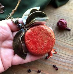 "This necklace already sold but I can make very similar (not 100% same) for your order. If you need longer chain please write it in comment to order) Statement juicy pomegranate pendant with leaves. Pomegranate seeds - natural garnet. skin and leaves - polymer clay. the bead at the top of the pendant is garnet. Garnet pomegranate ) Garnet - January birthstone Diameter of pomegranate 5cm (1.96\") Chain 48cm (19\")" Red Nature-inspired Jewelry For Gifts, Handmade Red Nature-inspired Necklace, Nature-inspired Gemstone Necklace For Gifts, Nature-inspired Gemstone Necklace For Gift, Handmade Garnet Pendant Necklace, Garnet Pendant Necklace For Gifting, Garnet Pendant Necklace Gift, Garnet Pendant Necklace For Gift, Garnet Pendant Necklaces For Gift