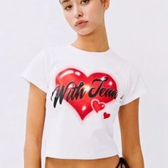 Xs With Jean Heart Tee. Nwt Never Worn. More Pics Coming Soon Fitted Casual T-shirt With Heart Graphic, Trendy Crew Neck Top With Heart Graphic, Trendy Heart-shaped Tops With Graphic Print, Trendy Heart Print Tops For Streetwear, Spring Heart Graphic T-shirt, Casual White Tops With Heart Graphic, Summer Tops With Heart Graphic, Spring Graphic Tee With Heart Design, White Heart Print Top For Streetwear