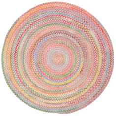 a multicolored circular rug on a white background