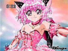 an anime character with pink hair and black ears