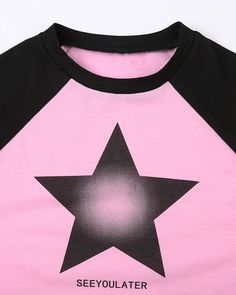 Details: Short-sleeve T-shirt with front star designTop Length: CroppedSleeve Length: Short SleevesMaterials:35% Cotton + 60% Polyester + 5% Spandex Crew Neck Tops With Star Logo For Summer, Casual Stretch Top With Star Print, Black Stretch Top With Star Print, Casual Black Top With Star Patch, Pink Crew Neck T-shirt With Star Print, Trendy Streetwear Tops With Star Patch, Pink Star Print Crew Neck T-shirt, Trendy Black Top With Star Patch, Black Crew Neck Top With Star Patch