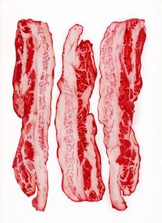 three strips of bacon are shown on a white surface with red lines in the middle