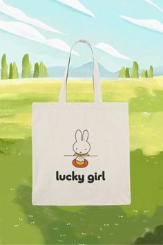 "LUCKY GIRLS UNITE!! Name a better way to channel your luck than a lucky girl tote! Please enjoy this 100% Natural Cotton Canvas Tote Bag to hold your Miffy plushie, flowers, textbooks, and groceries. Guaranteed to make you and your bestie scream with joy!    ✿ Each tote is made with water-based pigment inks which are non-hazardous and non-toxic, as well are printed using the latest garment technology!  Details: Material: 100% Natural Cotton Canvas Fabric, 6 oz./yd^2; Size: 15\" x 16\" (38.1cm x Casual Bags With Cute Design For Gift, Casual Bags Suitable As Gifts, Cute Rectangular Bags For Birthday Gift, Cute Shoulder Bag With Letter Print For Gift, Cute Letter Print Bag For Gift, Girls Tote, Lucky Girl, Birthday Gifts For Girls, Cute Bag