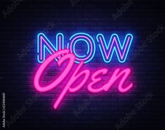 neon sign with the words now open