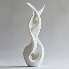 a white sculpture is shown against a gray background