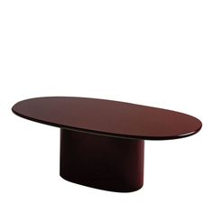 an oval conference table with a black base and dark wood grained finish on the top