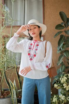 "Gorgeous vintage Hungarian floral embroidered blouse. The blouse features long sleeves with embroidered flowers. Made from soft cotton. Condition: In great vintage condition. Made in Switzerland Details and Measurements (Inch) size estimate: m *Measurements are taken in inches with the garment laying flat. BUST: 42 \" FULL LENGTH: 23 \" SLEEVE LENGTH: 26 \" from neck 18\" form armpits *If you are not sure about size please feel free to contact me I would be happy to help all questions and reque Long Sleeve Cotton Blouse With Embroidered Cuffs, Bohemian Cotton Blouse With Embroidered Cuffs, Folk Style Long Sleeve Top With Embroidered Cuffs, Summer Long Sleeve Blouse With Embroidered Cuffs, Long Sleeve Embroidered Top With Floral Design For Summer, Traditional Long Sleeve Blouse With Embroidered Cuffs, Long-sleeved Cotton Blouse With Embroidered Hem, Spring Long Sleeve Embroidered Top, Long Sleeve Cotton Blouse With Embroidered Hem