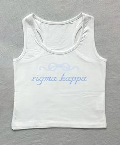 a white tank top with the word stigma kappa written on it in blue ink