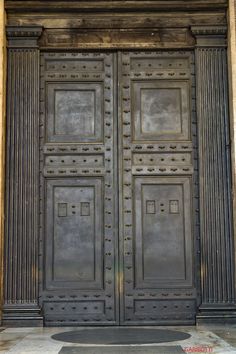 an old wooden door with intricate carvings on it