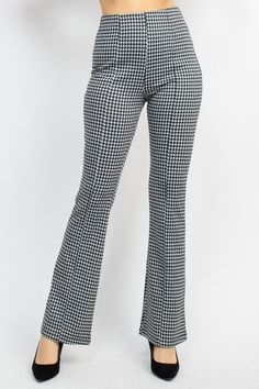 Imported S.M.L A knit pair of bell-bottom pants in a houndstooth pattern featuring a high waist, princess seams, fit and flare, and a full length. 85% Polyester 12% Rayon 3% Spandex  Black/White  IRI Plaid Bell Bottom Pants Item Measurements: SIZE S Measurements: SIZE S Inseam:30" Length:41" Hips:34" Rise:10" Statement Pants, Fashion Forward Outfits, White Houndstooth, Bell Bottom Pants, Princess Seams, Houndstooth Pattern, Bell Bottom, Black And White Colour, Princess Seam