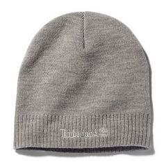 Top off your fall style with this soft winter beanie, featuring a double layer for warmth and an embroidered Timberland logo on the cuff | Timberland Men's Knit Logo Beanie in Light Grey Heather Casual Beanie With Embroidered Logo, Gray Beanie For Cold Weather In Fall, Casual Beanie With Embroidered Logo For Winter, Gray Fall Beanie For Cold Weather, Winter Cotton Beanie With Embroidered Logo, Casual Embroidered Logo Beanie For Winter, Classic Cotton Winter Hat, Classic Winter Beanie, One Size, Classic Winter Beanie Cap