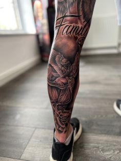 a man's leg with a tattoo on it and the words family written in black ink