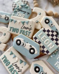 decorated cookies that say i love fast and two fast on the top one with eyes