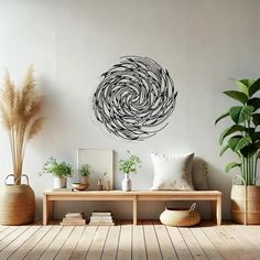 a living room filled with lots of furniture next to a wall mounted circular artwork on the wall