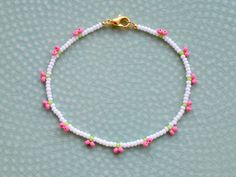 Dainty cherry beaded bracelet, made with 2mm small seed beads. Perfect as a small gift for a loved one.  If you would like the bracelet in a different color, please write me a message, I am happy to make a custom one for you. Each jewelry item comes in a colorful envelope, as seen in the last picture, and is ready to be gifted. You can find the matching necklace here https://www.etsy.com/GirassolBeads/listing/1359959725/ The same bracelet with red cherries https://www.etsy.com/GirassolBeads/list Summer Friendship Bracelets With Tiny Beads As Gifts, Summer Gift Friendship Bracelets With Tiny Beads, Trendy Colorful Beaded Anklets As Gift, Dainty Colorful Beads Anklets As A Gift, Dainty Anklets With Colorful Beads As Gift, Dainty Colorful Beaded Anklets As Gift, Delicate White Anklet As A Gift, Trendy Round Bead Anklets For Gift, Dainty White Anklets For Gift