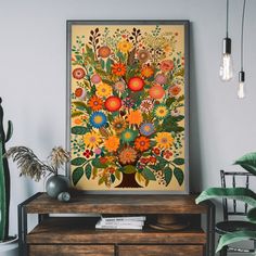 a painting on the wall above a dresser with flowers and plants in vases next to it