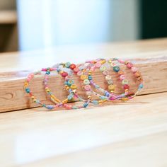 Super cute and bright custom name/word bracelets perfect for gifting or wearing on any occasion, from daily wear to vacation festivities! I hand-make each one-of-a-kind piece and take the extra time to re-do a design if I feel a more perfect pattern is possible :) Depending on the colors that are pulled for your selected word or name, I will use a variety of different glass beads, genuine gemstones, and other personally chosen beads for your bracelet.   All metals used are lead-free & nickel-free & cadmium-free  If you have any questions regarding any product, please message me! Shipping Details: All orders are shipped from Virginia, US, within 1 to 2 business days. Word Bracelets, Bracelet Summer, Word Bracelet, Custom Bracelet, Eco Friendly Packaging, Name Bracelet, Custom Bracelets, Precious Gemstones, Custom Name