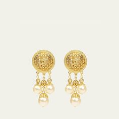 Ben-Amun clip earrings. 24-karat gold electroplating. Pearly white glass dangles. Approx. 2.5"L x 1.25"W. Clip-on backs. Made in USA. Elegant Clip-on Earrings With Latkans, Elegant Drop Clip-on Earrings With Latkans, White Gold Plated Chandelier Earrings, Gold Drop Clip-on Earrings With Latkans, Gold Latkan Drop Clip-on Earrings, Gold Drop Latkans Clip-on Earrings, Gold Clip-on Bridal Drop Earrings, Gold Dangle Clip-on Earrings With Latkans, Gold-tone Drop Clip-on Earrings