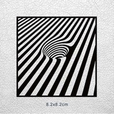 a black and white photo with stripes in the center on a leather background that looks like an optical illusion