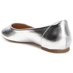 Looking for a versatile shoe that you can wear with any outfit? The Kavn round-toe ballet flat by Journee Collection is a classic and timeless design that will never go out of fashion. Made with soft and comfortable vegan leather, this shoe features a narrow-width footbed and a comfort insole that offers a perfect fit for your feet. Silver Slip-on Flats With Removable Insole, Classic Silver Flats With Round Toe, Silver Slip-on Flats For Spring, Classic Slip-on Ballet Flats, Silver Closed Toe Synthetic Flats, Silver Classic Flats For Spring, Classic Silver Flats For Spring, Silver Slip-on Closed Toe Flats, Classic Flats In Medium Width