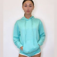 Made With Super Soft Fleece Fabric, This Hoodie Has Drawstring Hood And Front Pouch Pocket. Street-Ready Look .This Hoodie Features A Structured Hood & Kangaroo Pocket For On-The-Go Convenience And Cuffs At The Sleeves And Waistband. Provides Exceptional Quality Value & Style & Are Available In 7 Colors: Purple,Blue,Black,Rose Pink,Mint Aqua,Grey And Yellow. For Working Out And Wearing Out. 100% Premium Cotton ,Machine Washable,Long Sleeve. Blue Sweats With Ribbed Cuffs For Spring, Spring Hoodie Sweats With Kangaroo Pocket, Light Blue Sweatshirt With Ribbed Cuffs For Spring, Oversized Blue Sweats For Spring, Trendy Blue Stretch Hoodie, Oversized Light Blue Cotton Hoodie, Light Blue Long Sleeve Top With Drawstring Hood, Light Blue Long Sleeve Hooded Top, Blue Stretch Sweatshirt For Spring