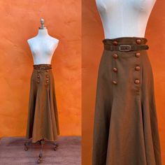 "Amazing skirt! Brown wool lined belted leather buttons Tag:Boutique by Elegance,S.A. Paris EUC Waist: 25.5\" Hip: 49\" Length: 35\"" Fitted Belted Skirt For Fall, Fall Brown Belted Skirt, Fitted Vintage Skirt For Fall, Fitted Vintage Mini Skirt, Retro Brown Bottoms With Button Closure, Vintage Skirt For Fall, Fitted Vintage Skirt For Vintage Fashion, Retro Fitted Skirt With Belt Loops, Brown Fitted Full Length Skirt