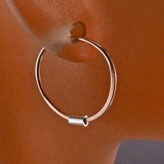 Small lightweight everyday earrings you can sleep in. Great for children, if you are looking for a secure small earring. Choose the metal for the hoop. -one PAIR of hoops -half inch -choose your metal - 14k rose gold filled / 14k yellow gold filled / sterling silver / niobium -the tube bead remains sterling but the hoop can change to whatever metal you prefer -standard ear wire gauge (20 gauge) -rounded and polished wire ends -shiny polished hoops A QUALITY PRODUCT - good clean even circles This Adjustable Nickel Free Rose Gold Hoop Earrings, Rose Gold Nickel-free Cartilage Earrings For Everyday, Everyday Rose Gold Nickel-free Cartilage Earrings, Everyday Nickel-free Rose Gold Cartilage Earrings, Adjustable Dangle Hoop Earrings In Rose Gold, Adjustable Rose Gold Hoop Earrings Gift, Nickel Free Hoop Cartilage Earrings For Everyday, Rose Gold Nickel-free Hoop Earrings As Gift, Gift Rose Gold Nickel-free Hoop Earrings