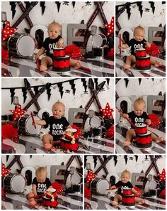 a baby sitting in front of a drum set