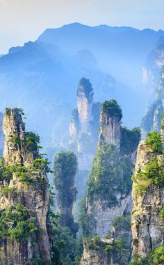 the mountains are surrounded by trees and rocks