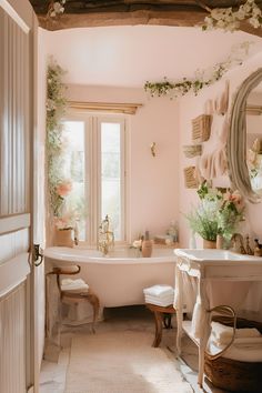 a bath room with a tub a sink and a mirror on the wall next to a window