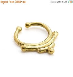 ON SALE. Indian style Fake Brass Septum Ring. by Umanativedesign Bohemian Gold Nose Rings For Festival, Bohemian Adjustable Septum Ring As Gift, Bohemian Adjustable Septum Ring Gift, Adjustable Round Bohemian Nose Rings, Bohemian Hoop Septum Ring As Gift, Adjustable Nickel-free Septum Ring, Bohemian Gold Septum Ring For Festivals, Bohemian Round Septum Ring As Gift, Bohemian Style Septum Ring Gift