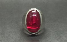 Cabochon Big Dark Deep Red Ruby Sterling Silver 925 Handmade Mens Heavy Ring Product: Ring Gemstone: Ruby Color: Red Handmade Ring It is heated and treated (lab created) but High Quality Ruby with pure 925 Sterling Silver Handmade Ring. Collectible Red Rings With Polished Finish, Collectible Red Ruby Ring With Polished Finish, Classic Sterling Silver Cabochon Ruby Ring, Classic Sterling Silver Ruby Ring With Cabochon, Red Polished Finish Signet Ring As Gift, Collectible Ruby Ring With Polished Finish, Formal Cabochon Ruby Ring In Sterling Silver, Collectible Red Gemstone Signet Ring, Red Polished Finish Collectible Jewelry