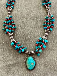 Pittsburgh artist Carolyn Roberts combines color, shape and texture in one-of-a-kind jewelry designs that are strikingly beautiful. "Turquoise" necklace with red glass and sterling silver beads measures 18" long. Turquoise Costume Jewelry Necklace With Colorful Beads, Southwestern Multi-strand Turquoise Gemstone Necklace, Southwestern Blue Multi-strand Turquoise Necklace, African Inspired Jewelry, Silver Southwestern Multi-stone Turquoise Necklace, Turquoise Statement Necklace, Southwestern Style Nickel-free Blue Turquoise Necklace, Turquoise Jewelry Native American, Beaded Anklets