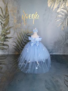 Elegant Light Blue Dress For Birthday, Light Blue Ball Gown Princess Dress For Parties, Elegant Light Blue Princess Dress For Birthday, Princess Style Embellished Tutu Dress For Pageants, Princess Style Embellished Pageant Dress, Elegant Blue Princess Dress For Birthday, Princess Style Embellished Dress For Baptism, Elegant Blue Baptism Dress For Party, Elegant Blue Pageant Dress For Baptism