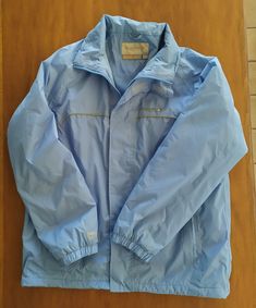 Light Blue Windbreaker and Waterproof Jacket with Flannel Lining Vintage Clothes Unisex Clothing Medium size An amazing light blue windbreaker jacket with flannel lining. It is great and in very good condition vintage contdition: very good, look pictures sizes: Medium but better look measurments. measurements: Sleeves 57 cm // 22,44 in armpit 51 cm // 20,07'' Shoulder to Shoulder (from seam to seam) 48 cm // 18,89 in Waist (double that) 52 cm // 20,47 in Length (measured at the back without coll Blue Fleece-lined Windbreaker For Fall, Blue Windbreaker With Pockets For Outdoor, Casual Blue Waterproof Windbreaker, Blue Long Sleeve Windbreaker For Outdoor Activities, Blue Waterproof Windbreaker For Travel, Blue Weatherproof Windbreaker For Outdoor, Blue Long Sleeve Windproof Raincoat, Blue Hooded Weatherproof Windbreaker, Weatherproof Long Sleeve Blue Outerwear