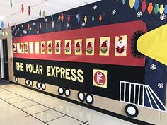 the polar express train is painted on the wall in an airport lobby with christmas decorations