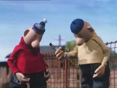 two cartoon characters are standing next to each other and one is holding a cell phone