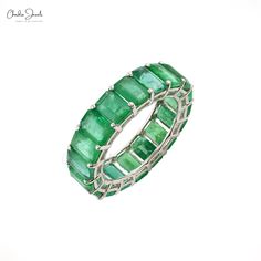 a ring made out of green stones