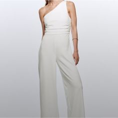 Zara One Shoulder White Jumpsuit Size Small. I’m 5’5 And A Half And It Was A Little Long On Me. Zara Jumpsuits And Rompers For Spring Night Out, Chic Zara Strapless Jumpsuit, Chic Strapless Jumpsuit By Zara, Elegant One-shoulder Bodysuit For Spring, Elegant Strapless Summer Jumpsuit By Zara, Chic Formal Bodysuit For Summer, Chic Summer Formal Bodysuit, Chic Formal Summer Bodysuit, Zara Evening Jumpsuits And Rompers For Spring