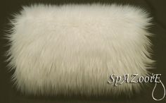 "NOTE: THIS IS THE MUFF THAT MATCHES OUR FUR TRIM IVORY SATIN CLOAKS This is an ivory faux fur hand muff made from extremely soft feathery long faux fur, nicely finished on the inside with high quality satin lining and is padded for extra warmth. Newly made and ready to ship. It has been a very popular choice to add to wedding orders for bridesmaids to carry down the isle instead of a flower bouquet. Not only is it more cost affective, but will give the girls something that they can use over and Hand Muff, Wedding Hands, Fur Wrap, Bridal Wrap, Silver Feather, White Faux Fur, Black Feathers, Kids Hands, Shawls And Wraps