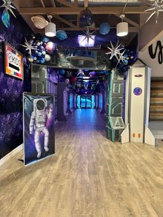 an image of a space themed hallway