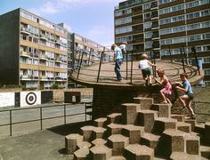 some kids are playing on the concrete steps