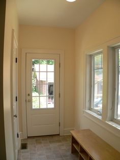 the hallway is clean and ready to be used as a place for someone to sit