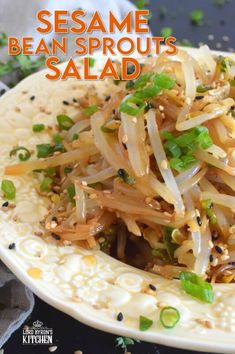 sesame bean sprouts salad on a white plate