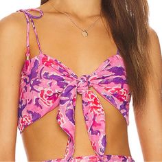 Completely Self Adjustable, This Bandeau Top Features A Tie From, Tie Shoulders, A Smocked Back And Lightweight Linen Fabric With Metallic Threading Throughout. 95.8% Viscose, 4.2% Metallic Fiber Made In India Dry Clean Only Width Of Band: 4.5 In. Width Of Cup: 5.25 In. (Widest Point) Pink Strapless Crop Top For Vacation, Strapless Pink Crop Top For Vacation, Pink Bandeau Crop Top For Summer, Purple Crop Top For Beach, Spring Season, Spring Beach Purple Crop Top, Purple Sleeveless Crop Top For Summer, Spring Beach Crop Top With Knotted Straps, Purple Crop Top For Vacation, Chic Pink Crop Top For Vacation