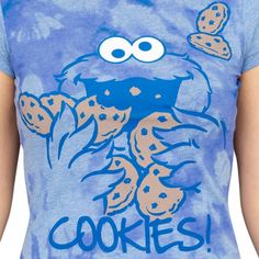 Who doesn't love Cookie Monster? He's the most adorable and cuddly little Muppet in the world! If you're looking for a cute and fun way to show some love for the cookie loving guy, look no further than this officially licensed Sesame Street t-shirt! Featuring one of the most notable characters on the show, this Cookie Monster t-shirt is an excellent choice for any fan of Sesame Street. Tie-Dye Blue 100% Cotton Juniors Fit Juniors fit is a teenagers/young woman fit Officially Licensed More Sesame