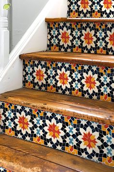 the stairs are decorated with colorful tiles