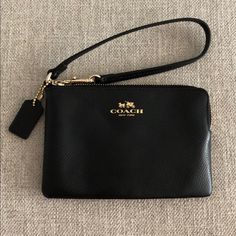 Black Leather Coach Wristlet, Never Used, Perfect Condition! Black Rectangular Wristlet For Gift, Rectangular Black Wristlet For Gift, Rectangular Black Wristlet As A Gift, Black Clutch Wristlet For Gift, Black Wallets With Wrist Strap For Evening, Black Clutch With Wrist Strap Gift, Black Wristlet With Zipper Closure For Gift, Black Evening Wallet With Wrist Strap, Black Rectangular Wristlet With Zipper Closure