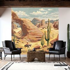 a living room with two chairs and a large painting on the wall behind them that has a desert scene